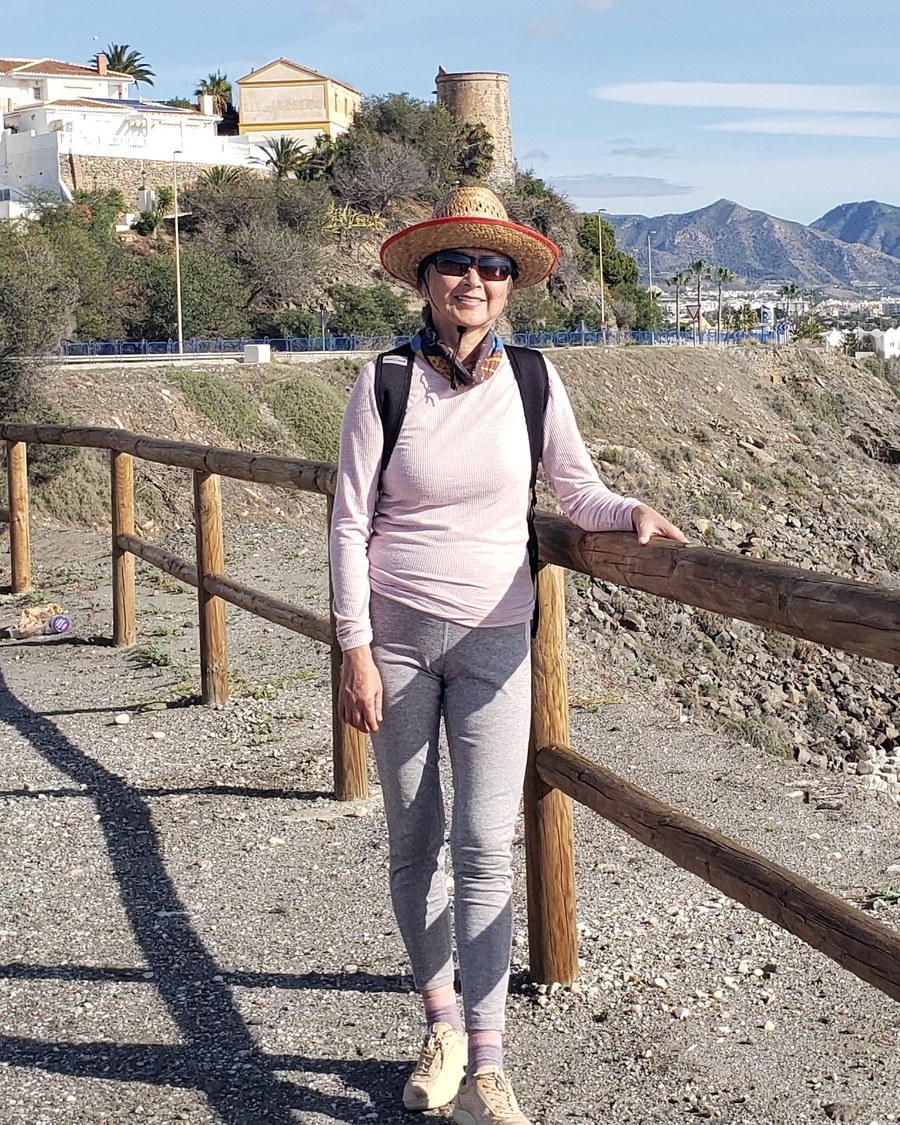 Cathy, founder of AI Gives Back, on a coastal walking path